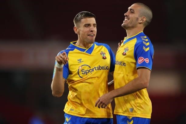 Jan Bednarek and Oriol Romeu of Southampton celebrate winning the penalty shoot out 2-4 during the Carabao Cup Third Round match between Sheffield...