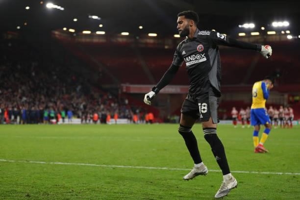 Goalkeeper Wes Foderingham of Sheffield United celebrates after saving a penalty taken by Armando Broja of Southampton in the penalty shoot out...