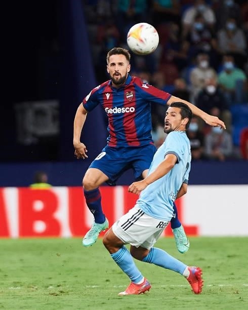 Jorge Miramon of UD Levante and Manuel Agudo Duran, Nolito of Celta Vigo battle for the ball during the LaLiga Santander match between Levante UD and...
