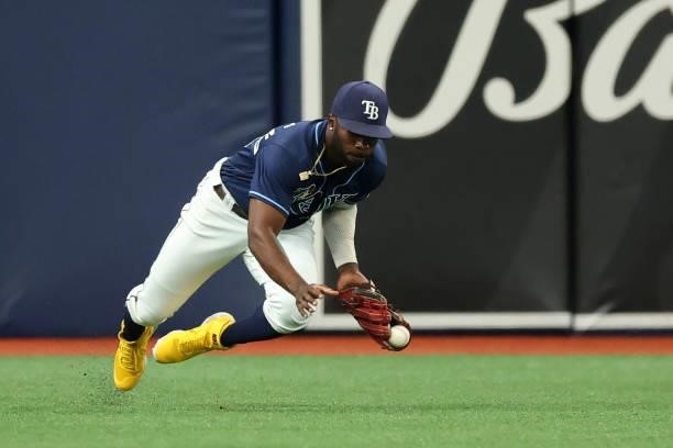 Randy Arozarena of the Tampa Bay Rays makes a running catch in the first inning during the game between the Toronto Blue Jays and the Tampa Bay Rays...