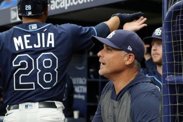 Manager Kevin Cash of the Tampa Bay Rays reacts after an RBI single by Taylor Walls in the third inning during the game between the Toronto Blue Jays...