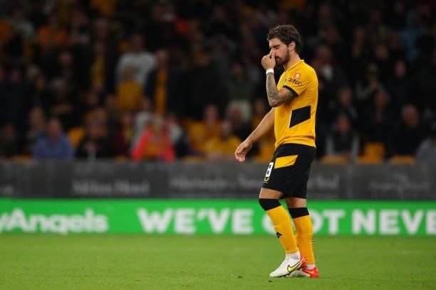 Rúben Neves of Wolverhampton Wanderers reacts after missing a penalty in the shoot out during the Carabao Cup Third Round match between Wolverhampton...