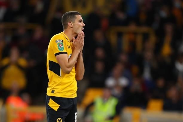 Conor Coady of Wolverhampton Wanderers reacts after missing a penalty in the shoot out during the Carabao Cup Third Round match between Wolverhampton...