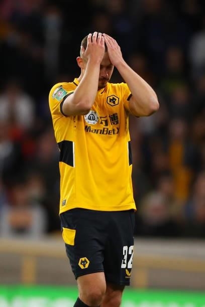 Leander Dendoncker of Wolverhampton Wanderers reacts after missing a penalty in the shoot out during the Carabao Cup Third Round match between...