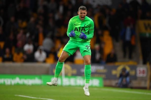 Pierluigi Gollini of Tottenham Hotspur celebrates victory in the shoot out during the Carabao Cup Third Round match between Wolverhampton Wanderers...