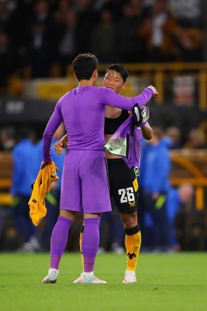 Son Heung-min of Tottenham Hotspur swaps shirts with fellow South Korea player Hwang Hee-chan of Wolverhampton Wanderers after the Carabao Cup Third...