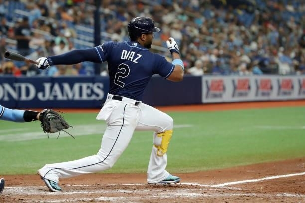Yandy Diaz of the Tampa Bay Rays hits an RBI single in the fourth inning during the game between the Toronto Blue Jays and the Tampa Bay Rays at...