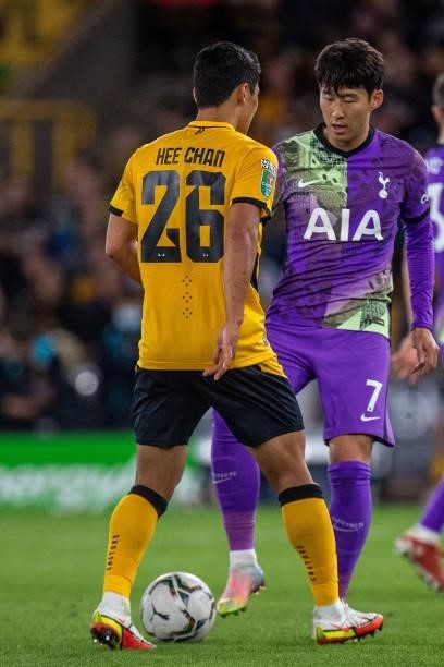 Hee Chan Hwang,of Wolverhampton Wanderers and Son Heung-min of Tottenham Hotspur in action during the Carabao Cup Third Round match between...
