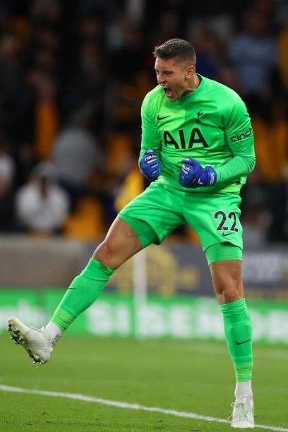 Pierluigi Gollini of Tottenham Hotspur celebrates after he saves the winning penalty during the Carabao Cup Third Round match between Wolverhampton...