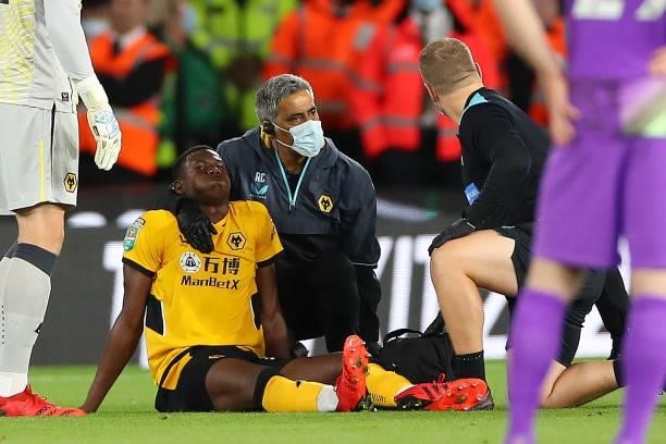 Yerson Mosquera of Wolverhampton Wanderers suffers an injury on his debut during the Carabao Cup Third Round match between Wolverhampton Wanderers...