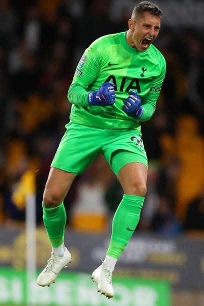Pierluigi Gollini of Tottenham Hotspur celebrates after he saves the winning penalty during the Carabao Cup Third Round match between Wolverhampton...