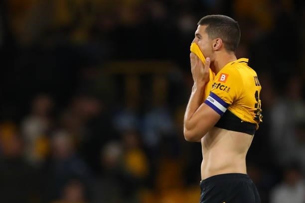 Conor Coady of Wolverhampton Wanderers react after missing the decisive penalty during the Carabao Cup Third Round match between Wolverhampton...