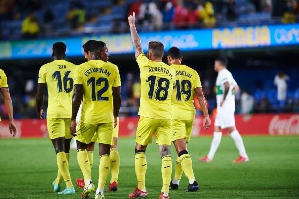 Players of Villarreal celebrate after his team mate Alberto Moreno of FC Villarreal scored the fourth goal during the LaLiga Santander match between...