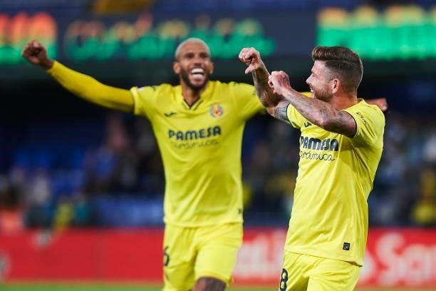 Alberto Moreno of Villarreal CF and Etienne Capoue of Villarreal CF celebrates after scoring his team's fourth goal during the LaLiga Santander match...