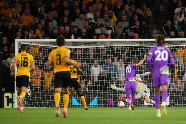 Harry Kane of Tottenham Hotspur scores a goal to make it 0-2 during the Carabao Cup Third Round match between Wolverhampton Wanderers and Tottenham...