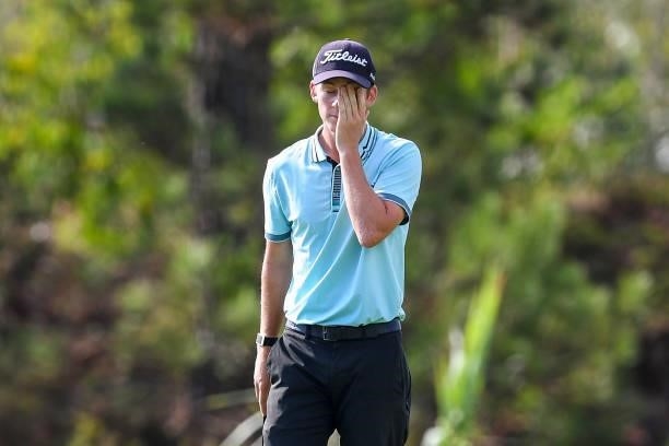 Daniel Hillier of New Zealand reacts after plays his second shot at the 3rd hole during Day Two of the Open de Portugal at Royal Obidos at Royal...