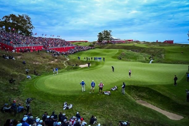 Scenic view as Justin Thomas of the U.S. Team putts on the 18th hole green during Friday Afternoon Four-ball Matches of the 43rd Ryder Cup at...