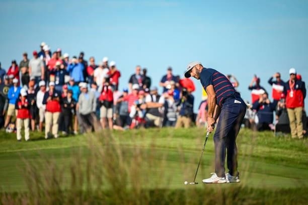 Dustin Johnson of the U.S. Team putts on the 14th hole green during Friday Afternoon Four-ball Matches of the 43rd Ryder Cup at Whistling Straits on...