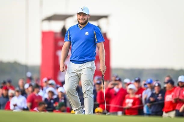 Tyrrell Hatton of England and Team Europe reacts to missing a putt on the 15th hole green during Friday Afternoon Four-ball Matches of the 43rd Ryder...