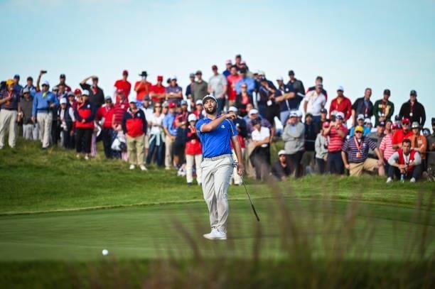 Jon Rahm of Spain and Team Europe reacts to missing a putt on the 14th hole green during Friday Afternoon Four-ball Matches of the 43rd Ryder Cup at...