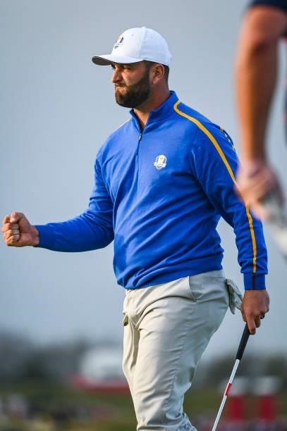 Jon Rahm of Spain and Team Europe celebrates with a fist pump after making a putt on the 16th hole green during Friday Afternoon Four-ball Matches of...