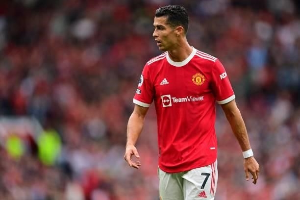 Manchester United's Portuguese striker Cristiano Ronaldo reacts during the English Premier League football match between Manchester United and Aston...