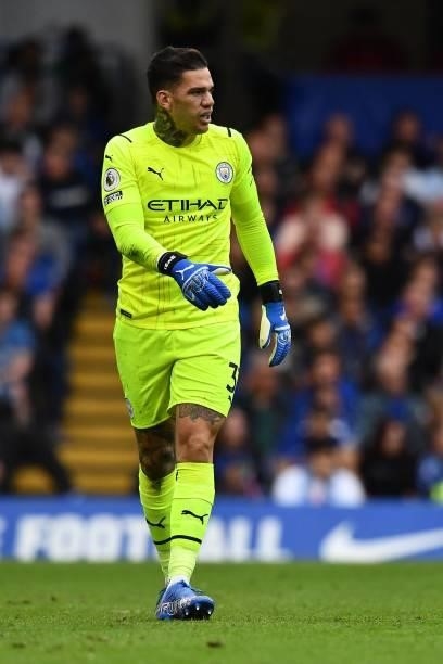 Manchester City's Brazilian goalkeeper Ederson looks on during the English Premier League football match between Chelsea and Manchester City at...