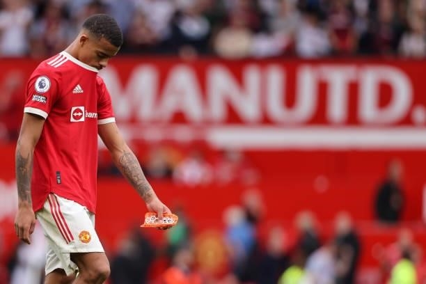 Dejected Mason Greenwood of Manchester United walks off dejected after losing to Aston Villa during the Premier League match between Manchester...