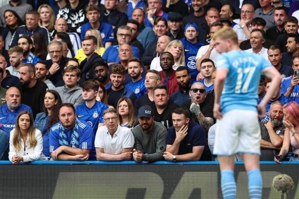 Chelsea fans look unhappy as Kevin de Bruyne of Man City steps up to take a corner kick during the Premier League match between Chelsea and...