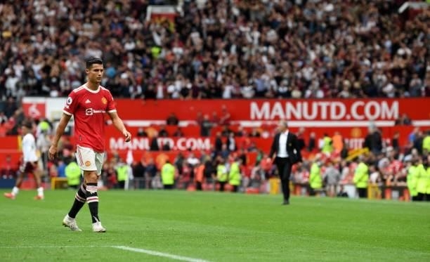 Manchester United's Portuguese striker Cristiano Ronaldo walks off of the pitch after the final whitle during the English Premier League football...