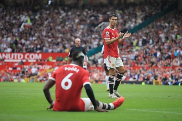 Cristiano Ronaldo of Manchester United applauds the efforts of Paul Pogba of Manchester United during the Premier League match between Manchester...