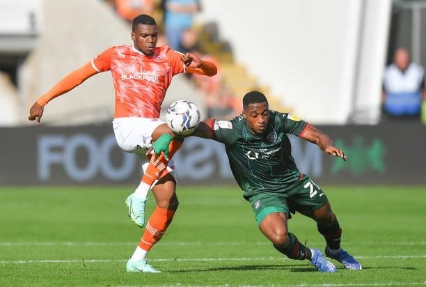 Blackpool's Dujon Sterling battles with Barnsley's Toby Sibbick during the Sky Bet Championship match between Blackpool and Barnsley at Bloomfield...