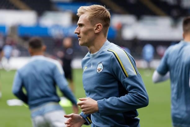 Flynn Downes of Swansea City warms up prior to the game during the Sky Bet Championship match between Swansea City and Huddersfield Town at the...