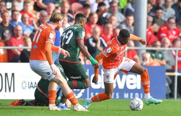 Blackpool's Dujon Sterling battles for the ball during the Sky Bet Championship match between Blackpool and Barnsley at Bloomfield Road on September...