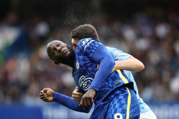 Spray flies off the head of Romelu Lukaku of Chelsea after he heads the ball during the Premier League match between Chelsea and Manchester City at...