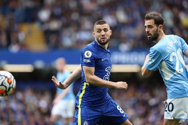 Mateo Kovacic of Chelsea and Bernardo Silva of Man City look round for the ball during the Premier League match between Chelsea and Manchester City...
