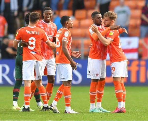 Blackpool players celebrate at the final whistle during the Sky Bet Championship match between Blackpool and Barnsley at Bloomfield Road on September...