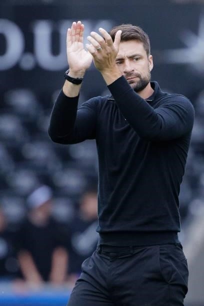Swansea City manager Russell Martin thanks home supporters after the final whistle during the Sky Bet Championship match between Swansea City and...