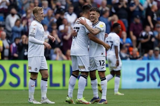 Joel Piroe of Swansea City celebrates his goal with Jamie Paterson during the Sky Bet Championship match between Swansea City and Huddersfield Town...