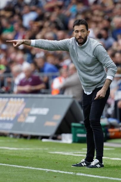 Huddersfield Town manager Carlos Corberan reacts on the touchline during the Sky Bet Championship match between Swansea City and Huddersfield Town at...