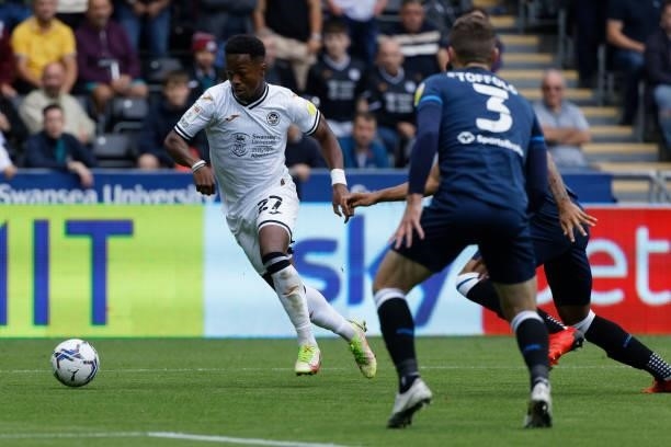 Ethan Laird of Swansea City [#in action during the Sky Bet Championship match between Swansea City and Huddersfield Town at the Swansea.com Stadium...