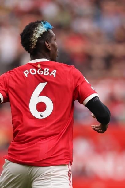 Paul Pogba of Manchester United with his hair dyed white and blue during the Premier League match between Manchester United and Aston Villa at Old...