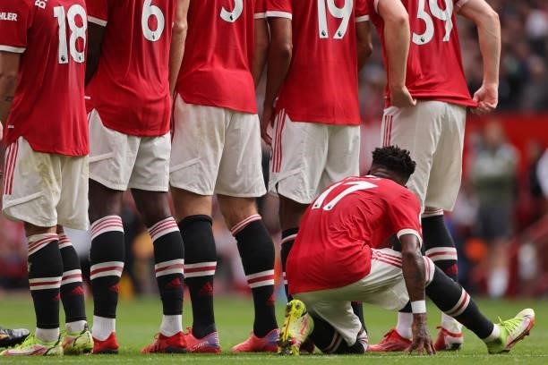 Fred of Manchester United hides behind the defence wall to block a free kick during the Premier League match between Manchester United and Aston...