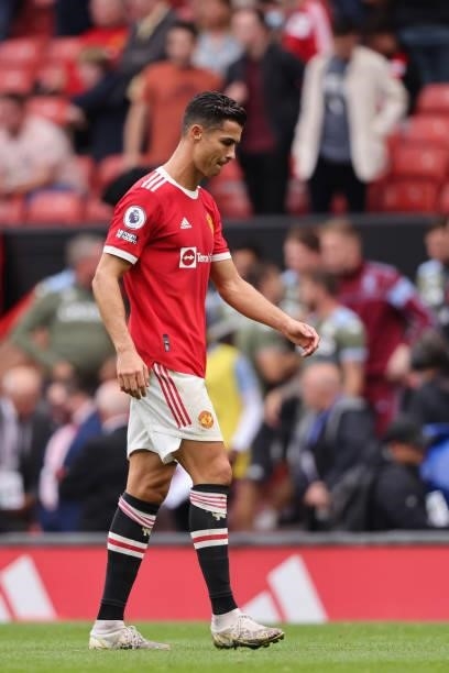 Cristiano Ronaldo of Manchester United walks off after losing 0-1 during the Premier League match between Manchester United and Aston Villa at Old...