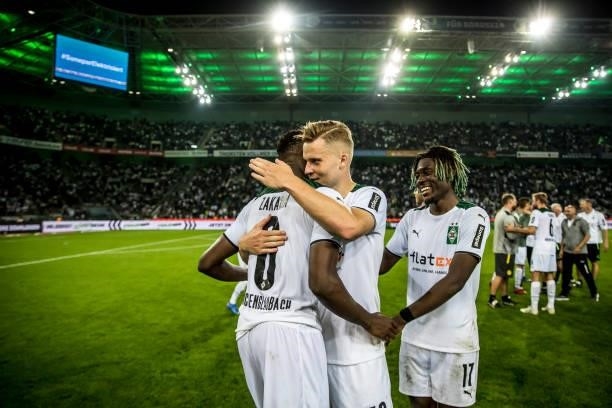 The Team of Borussia Moenchengladbach celebrate after the Bundesliga match between Borussia Moenchengladbach and Borussia Dortmund at Borussia-Park...