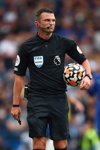 Referee Michael Oliver during the Premier League match between Chelsea and Manchester City at Stamford Bridge on September 25, 2021 in London,...