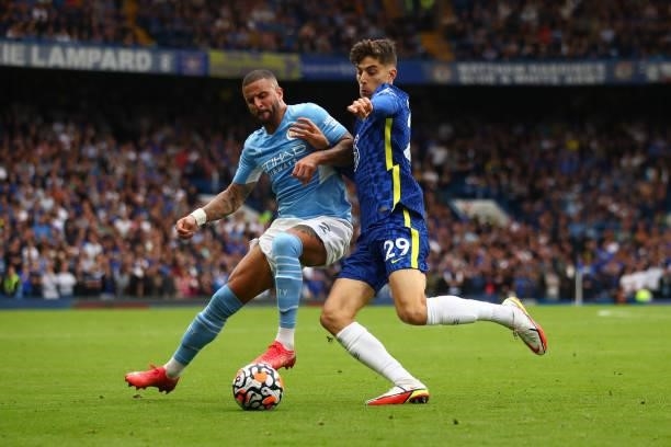 Kyle Walker of Manchester City in action with Kai Havertz of Chelsea during the Premier League match between Chelsea and Manchester City at Stamford...
