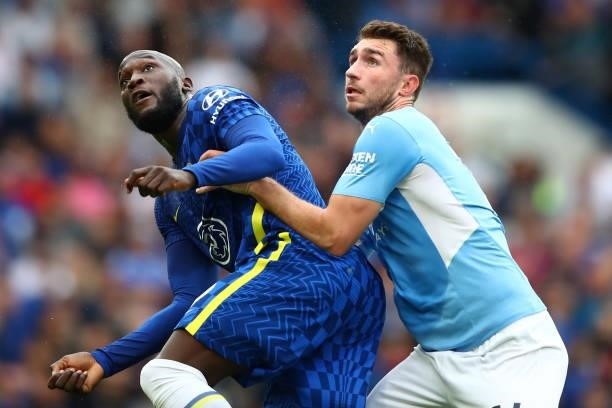 Romelu Lukaku of Chelsea tangles with Aymeric Laporte of Manchester City during the Premier League match between Chelsea and Manchester City at...