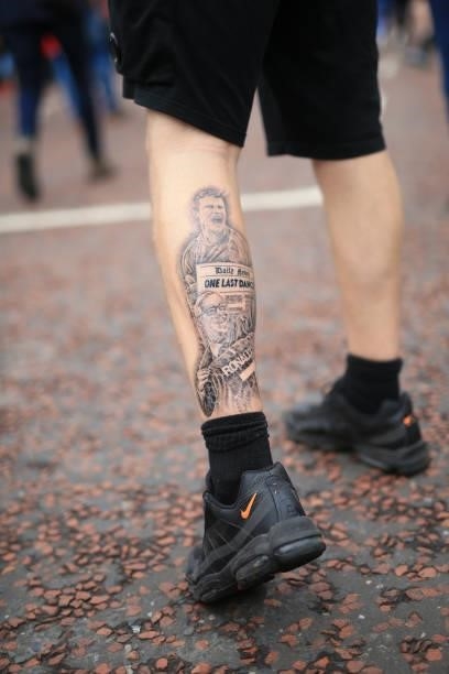 Manchester United fan shows off his tattooed leg before the Premier League match between Manchester United and Aston Villa at Old Trafford on...
