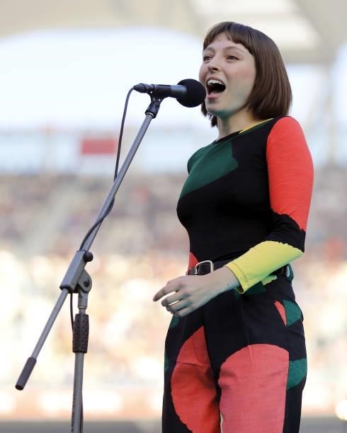 Stella Donnelly performs during the 2021 Toyota AFL Grand Final match between the Melbourne Demons and the Western Bulldogs at Optus Stadium on...